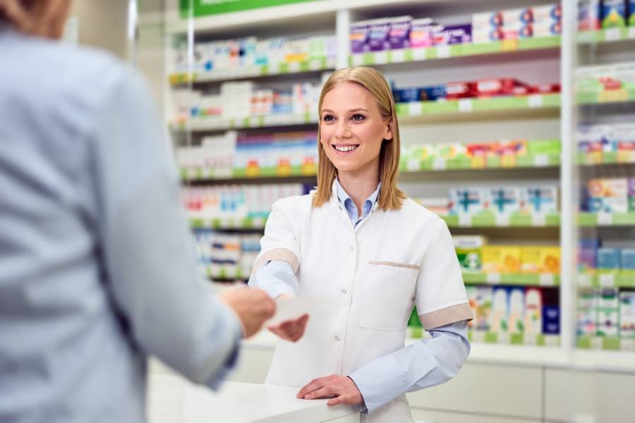 woman-pharmacist-assisting-customer-in-pharmacy-se-2026-09-25-00-38-45-utc (1)